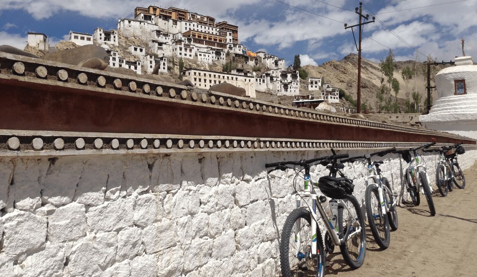 Cyclists riding the Manali to Leh route across high-altitude mountain passes in the Indian Himalayas